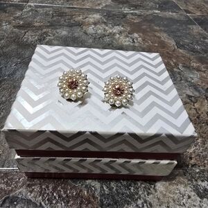 gold tone faux pearl earrings with a pink stone